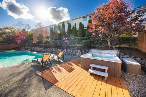 Stylish 4BR retreat with pool & year-round hot tub! - Image 1
