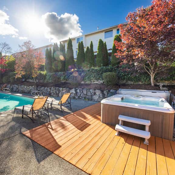Stylish 4BR retreat with pool & year-round hot tub! - Image 1
